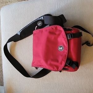 CRUMPLER Tallee red, gray, & black camera bag.  Large bag with lots of storage.